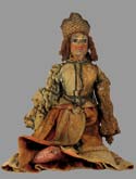 wooden doll in superb clotihing